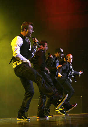 The Boys dancing in concert